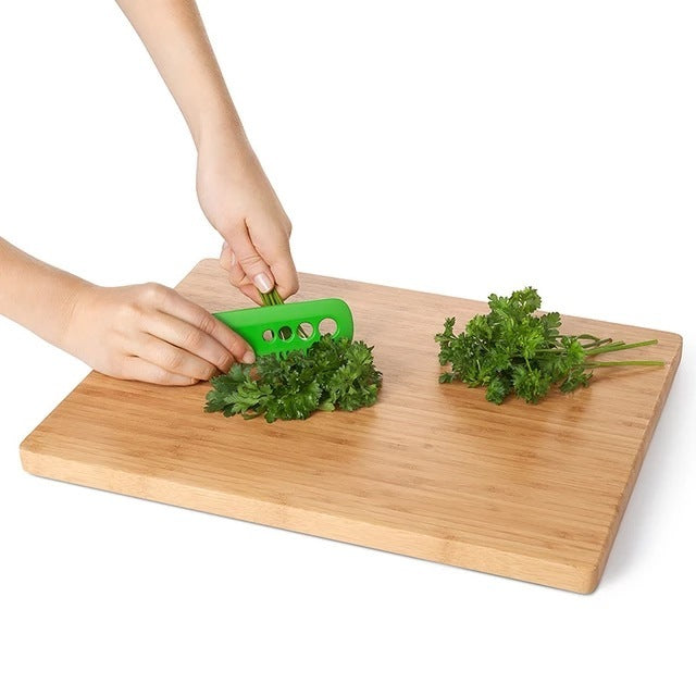 Mini vegetable peeler for removing leaves from stems