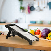 Stainless steel mandoline slicer with food holder for vegetables